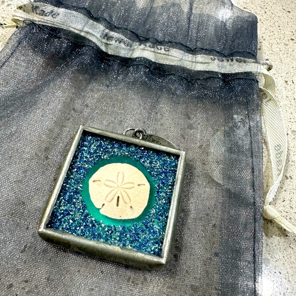 Jewel Kade Sand Dollar pendant